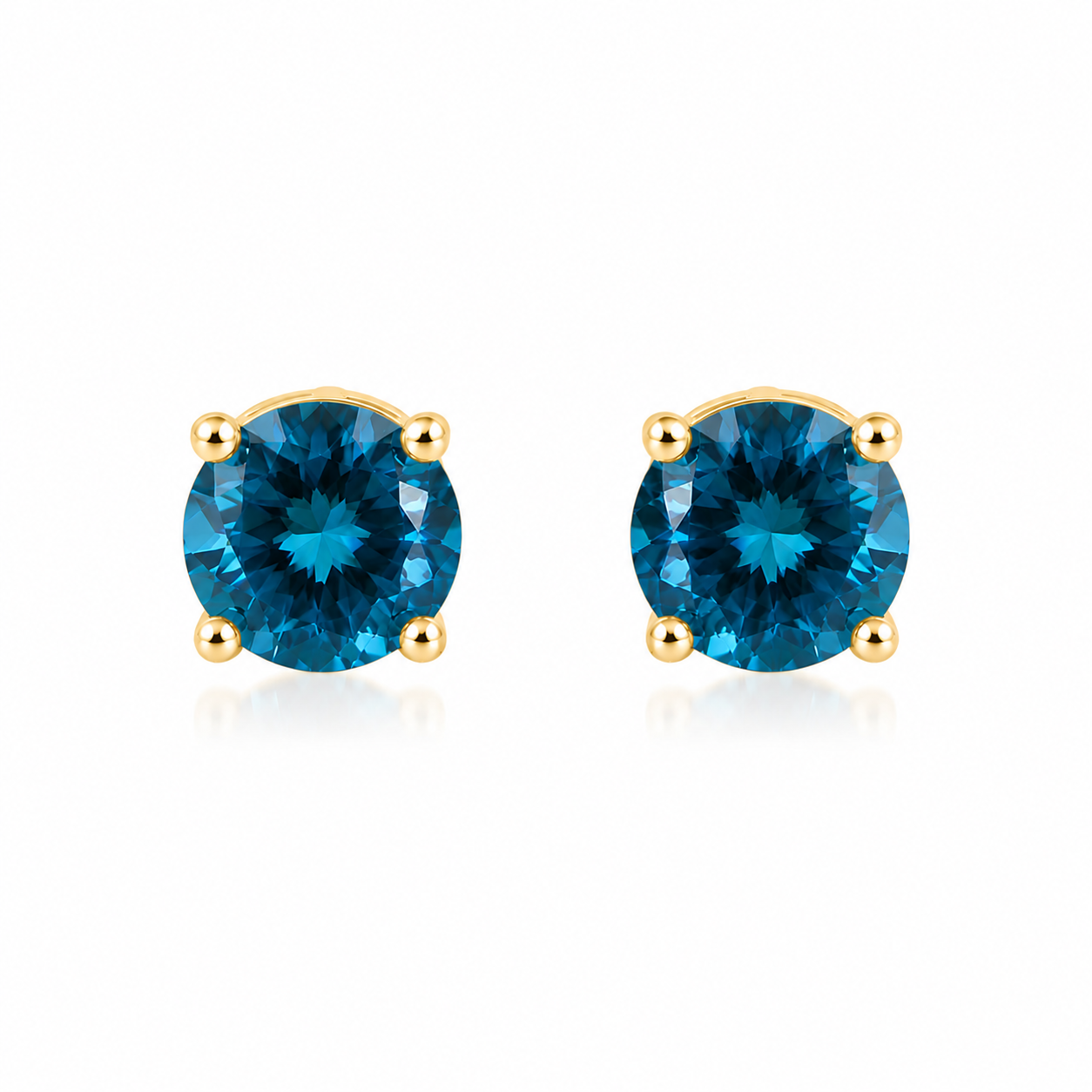 5mm round London Blue Topaz stud earrings in solid 925 sterling silver with four-prong settings on a white background