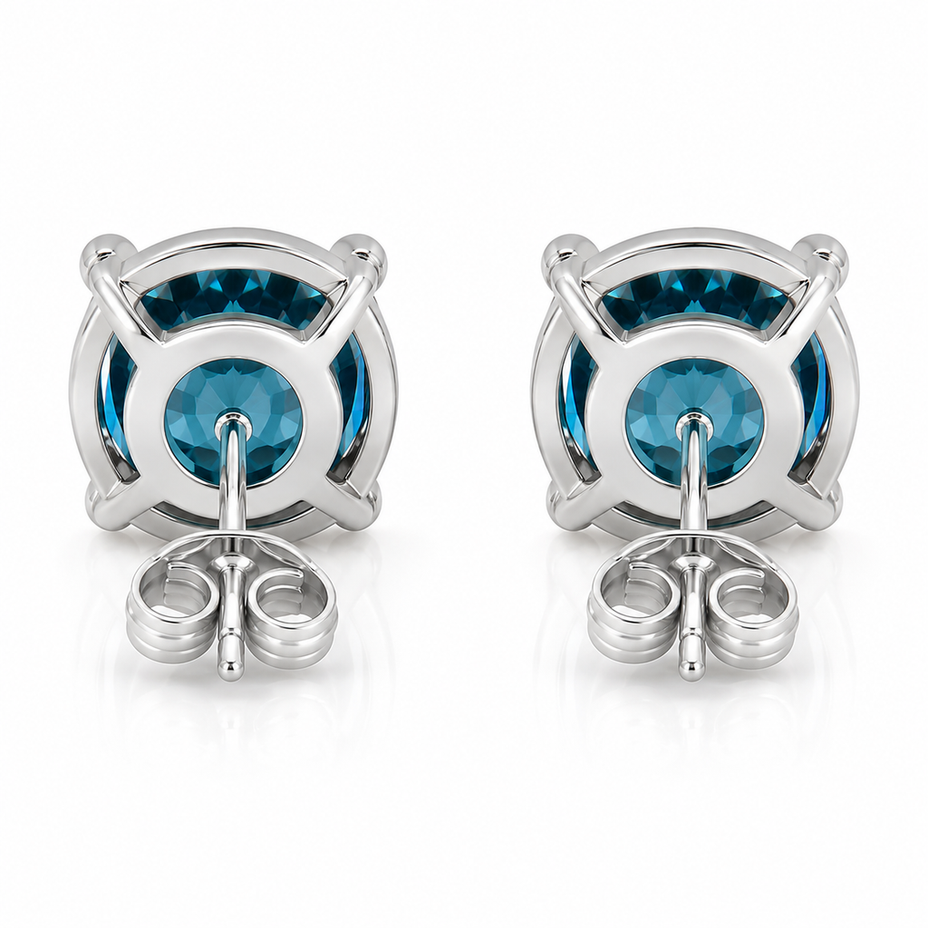 5mm round London Blue Topaz stud earrings in solid 925 sterling silver with four-prong settings on a white background