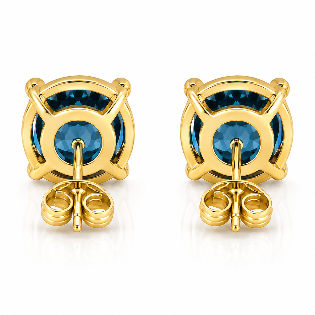 5mm round London Blue Topaz stud earrings in solid 925 sterling silver with four-prong settings on a white background