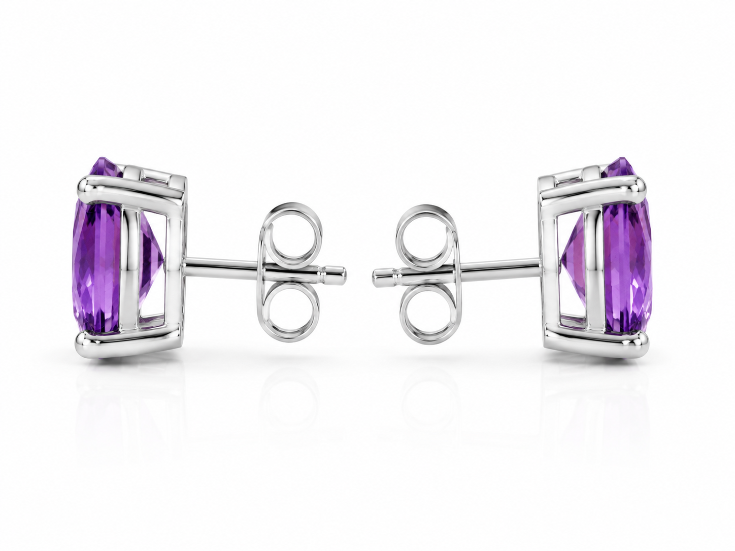 Side profile of natural amethyst stud earrings showing four-prong basket setting