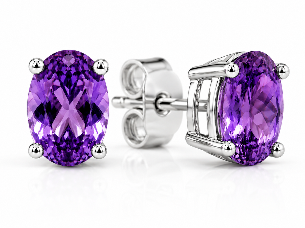 Macro close-up of natural oval amethyst gemstones in sterling silver stud earrings