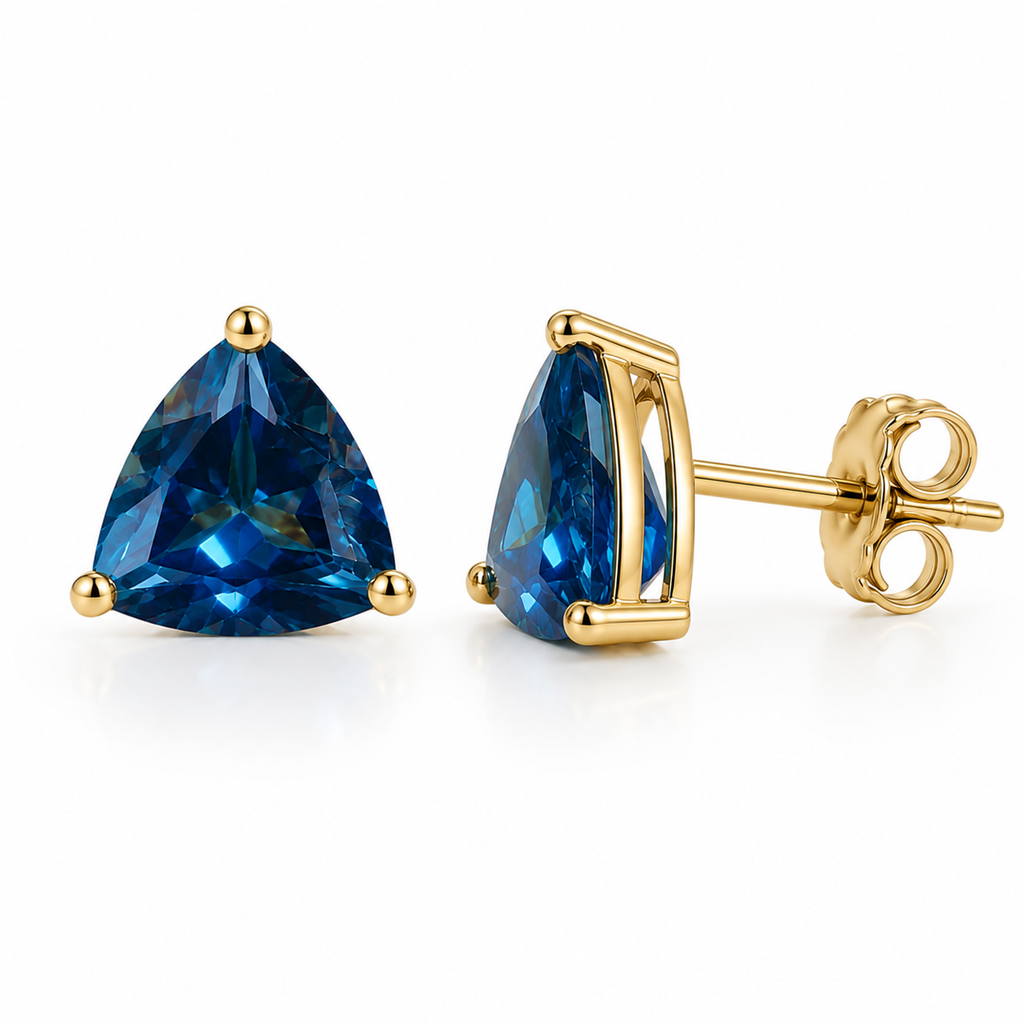 Natural 7mm trillion-cut London Blue Topaz stud earrings in solid 925 sterling silver with classic three-prong settings on a white background