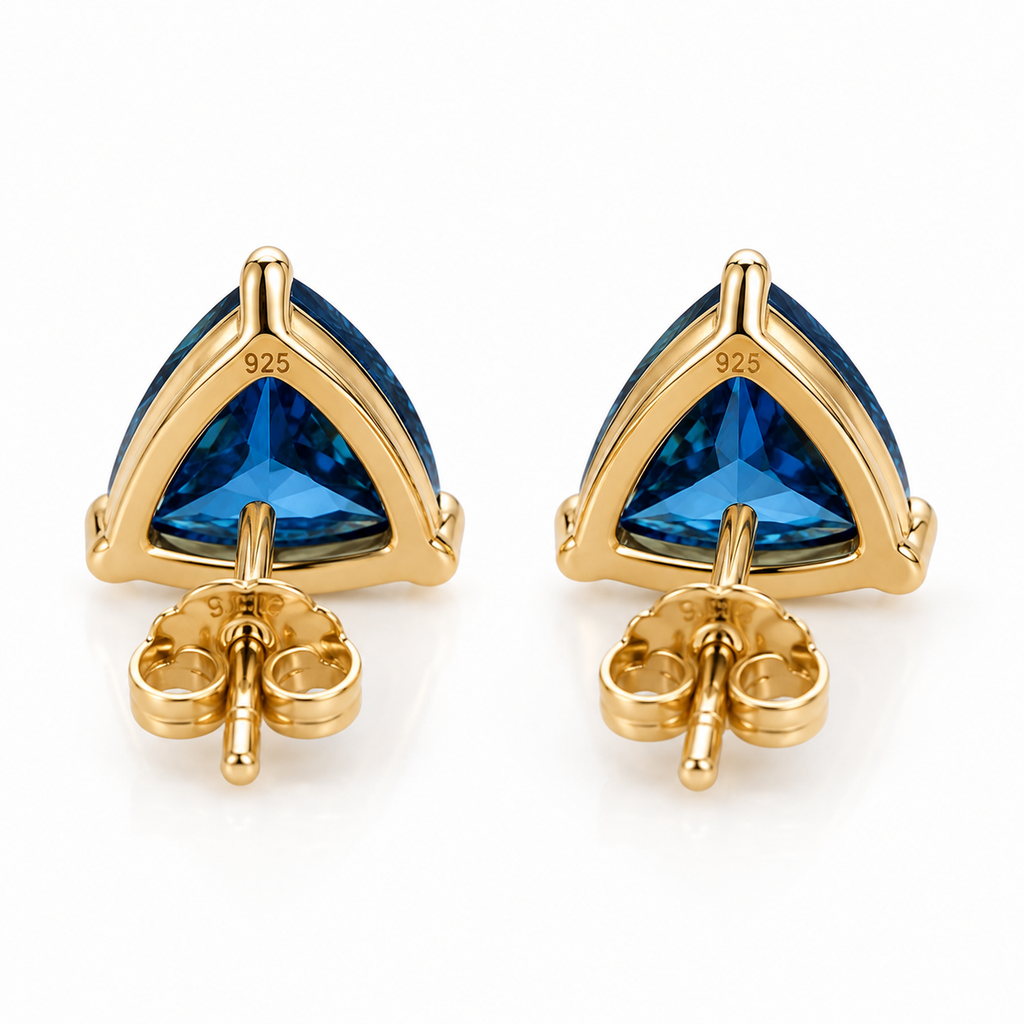 Natural 7mm trillion-cut London Blue Topaz stud earrings in solid 925 sterling silver with classic three-prong settings on a white background
