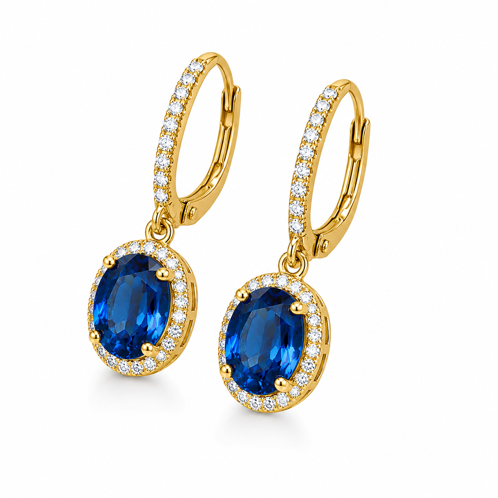 Natural 6x8mm oval London Blue Topaz halo dangle earrings in solid 925 sterling silver with secure leverback closures, available in platinum, yellow gold, or rose gold finish, presented in a PHIMSERA gift box.