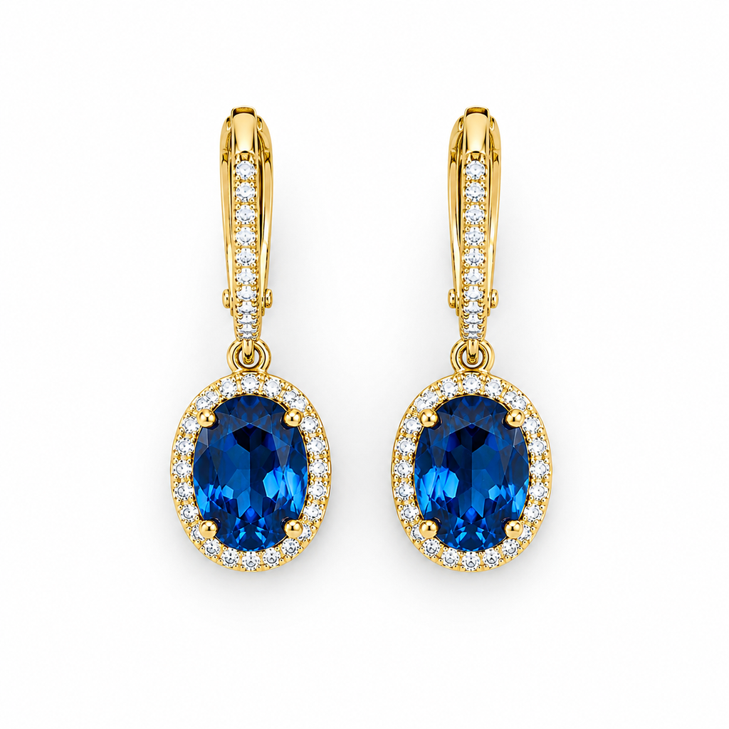 Natural 6x8mm oval London Blue Topaz halo dangle earrings in solid 925 sterling silver with secure leverback closures, available in platinum, yellow gold, or rose gold finish, presented in a PHIMSERA gift box.
