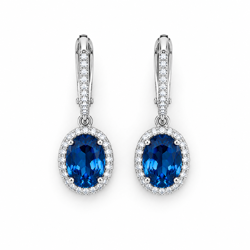 Natural 6x8mm oval London Blue Topaz halo dangle earrings in solid 925 sterling silver with secure leverback closures, available in platinum, yellow gold, or rose gold finish, presented in a PHIMSERA gift box.
