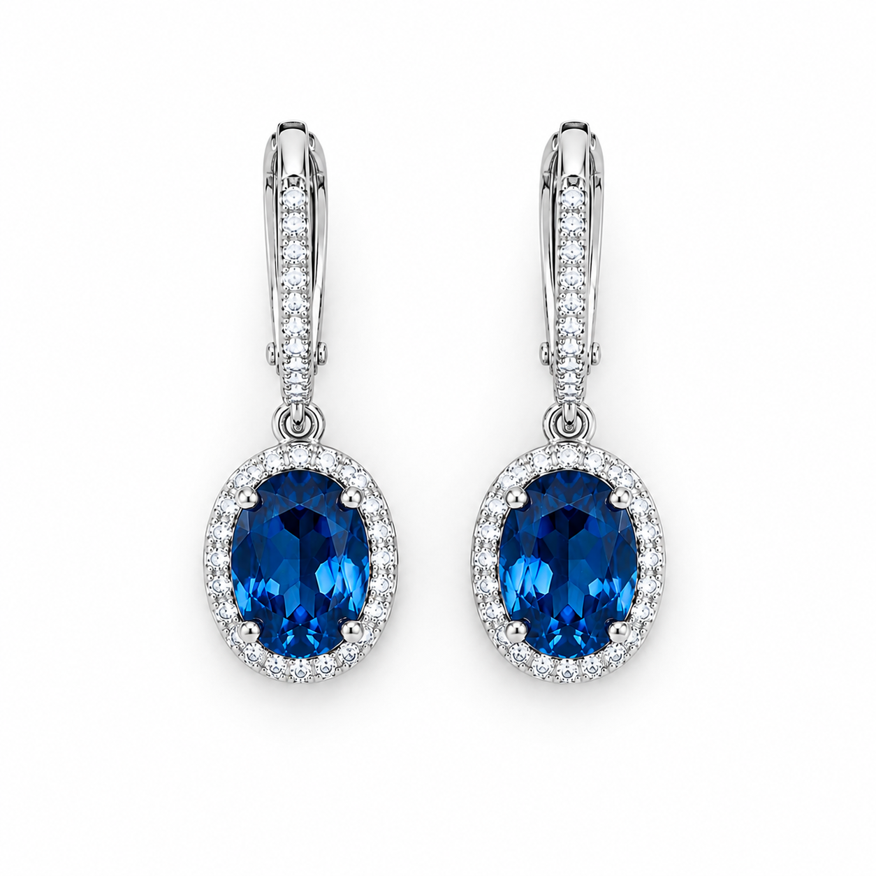 Natural 6x8mm oval London Blue Topaz halo dangle earrings in solid 925 sterling silver with secure leverback closures, available in platinum, yellow gold, or rose gold finish, presented in a PHIMSERA gift box.