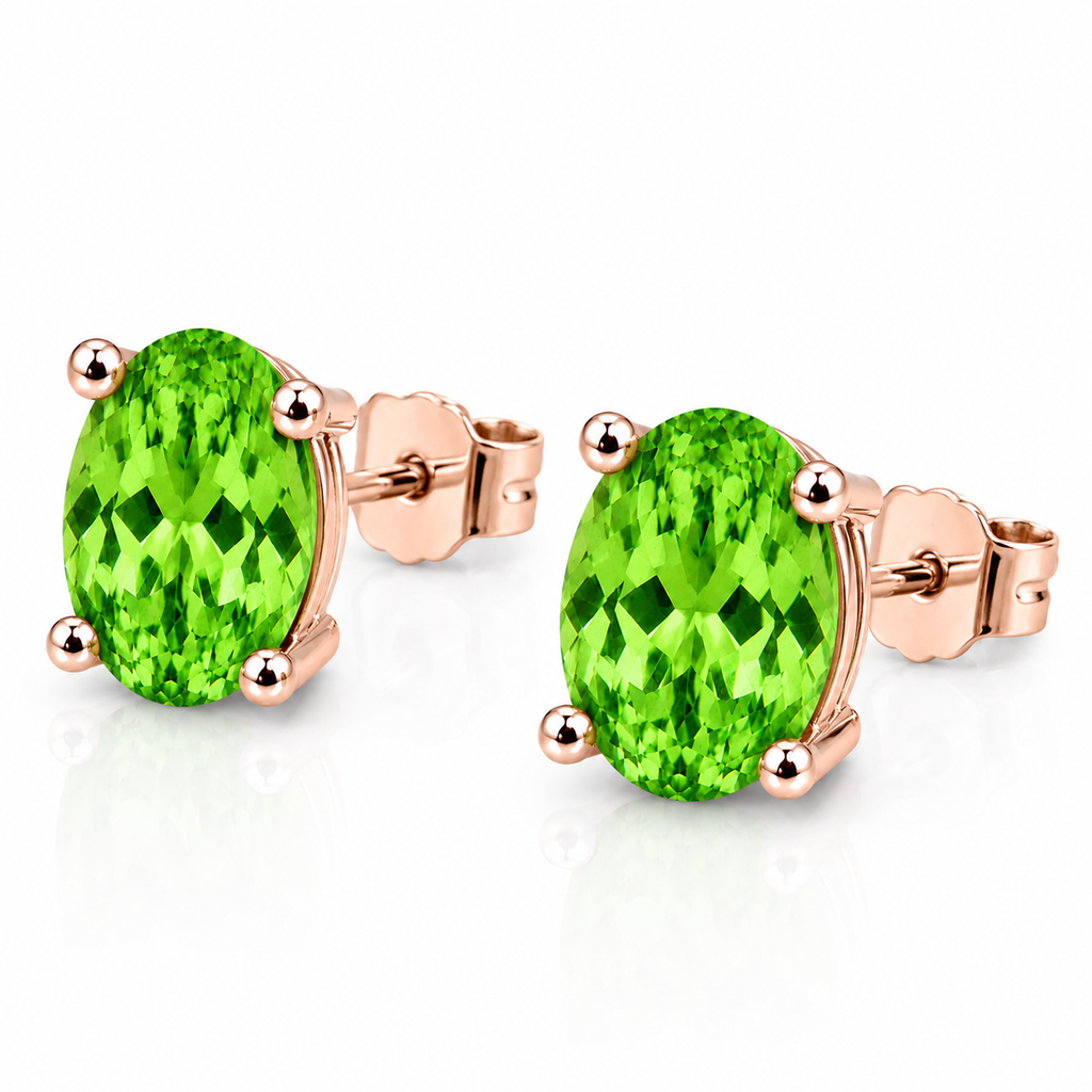 45-degree view of natural 4x6mm tsavorite garnet stud earrings in sterling silver solitaire setting