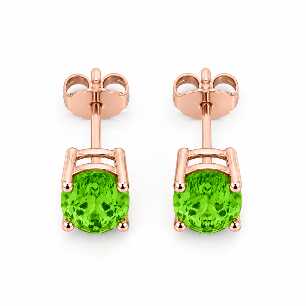 Top-down view of natural oval tsavorite garnet stud earrings in 925 sterling silver