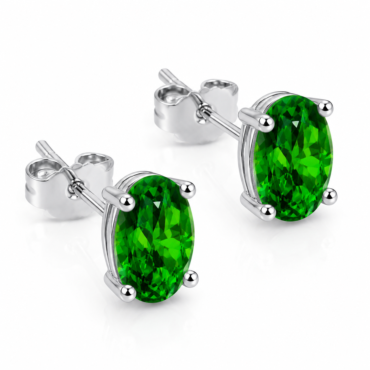 45 degree view of natural 4x6mm chrome diopside stud earrings in sterling silver