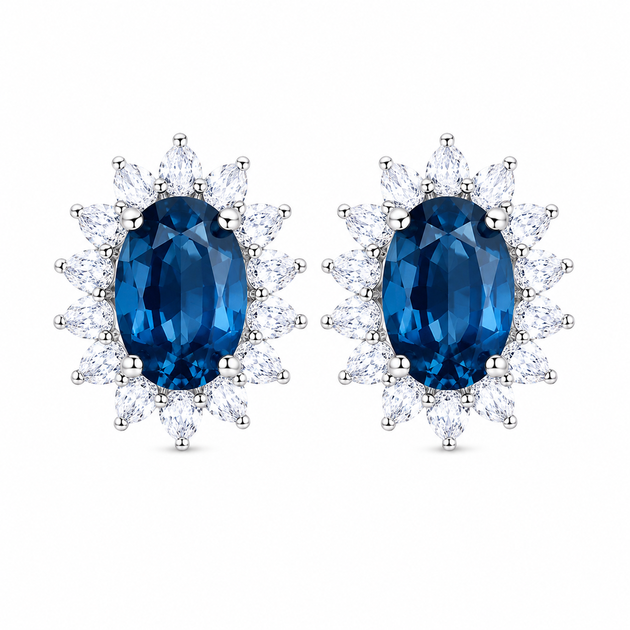 Natural 6x8mm oval London Blue Topaz halo stud earrings in solid 925 sterling silver, available in platinum, yellow gold, or rose gold finish, presented in a PHIMSERA gift box.
