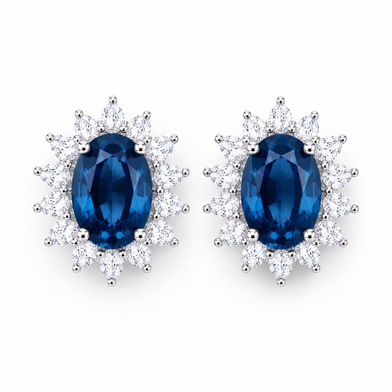 Natural 6x8mm oval London Blue Topaz halo stud earrings in solid 925 sterling silver, available in platinum, yellow gold, or rose gold finish, presented in a PHIMSERA gift box.