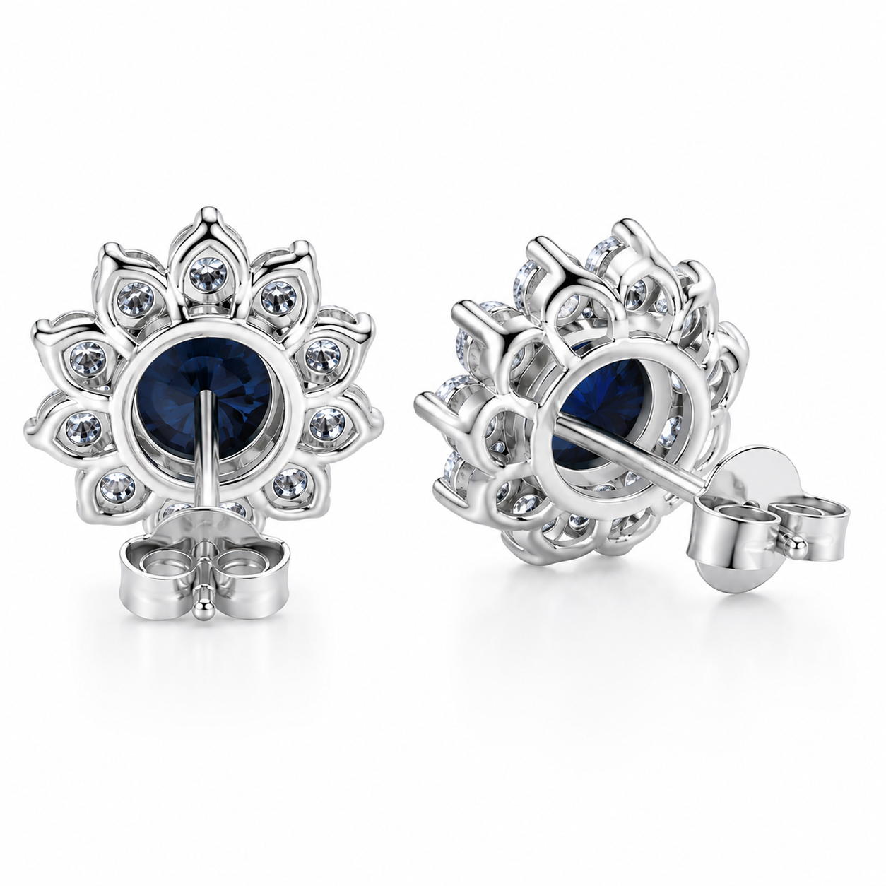 PHIMSERA Natural 5mm round London Blue Topaz floral halo stud earrings in solid 925 sterling silver with platinum plating, available in yellow gold or rose gold plating, presented in a PHIMSERA gift box.