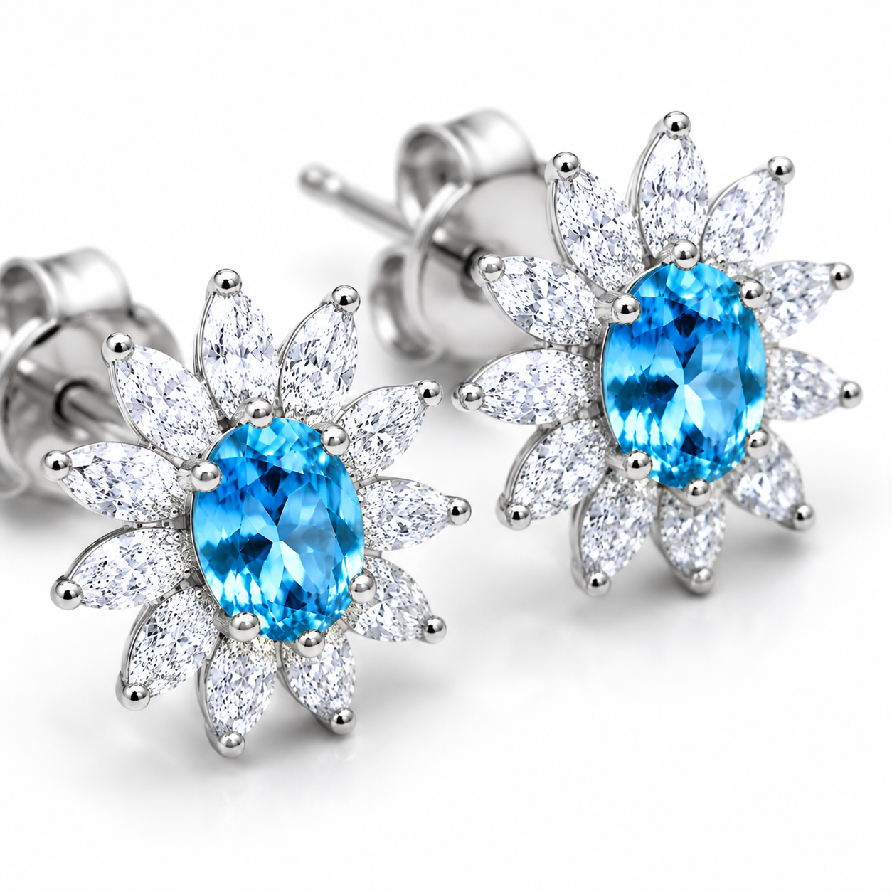Natural 4x6mm Swiss Blue Topaz floral halo stud earrings in 925 sterling silver with marquise cubic zirconia accents