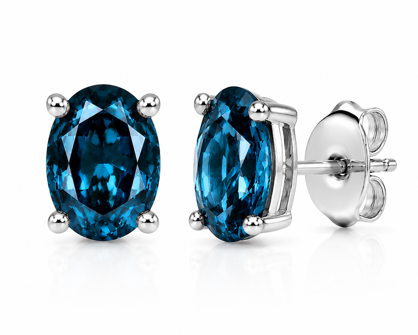 Natural 4x6mm oval London Blue Topaz solitaire stud earrings in 925 sterling silver with platinum plated finish