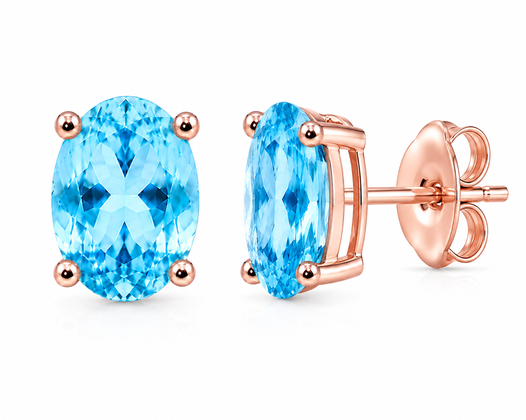 Natural Swiss Blue Topaz stud earrings shown at a three-quarter angle with Rose Gold Plated four-prong settings and butterfly backs