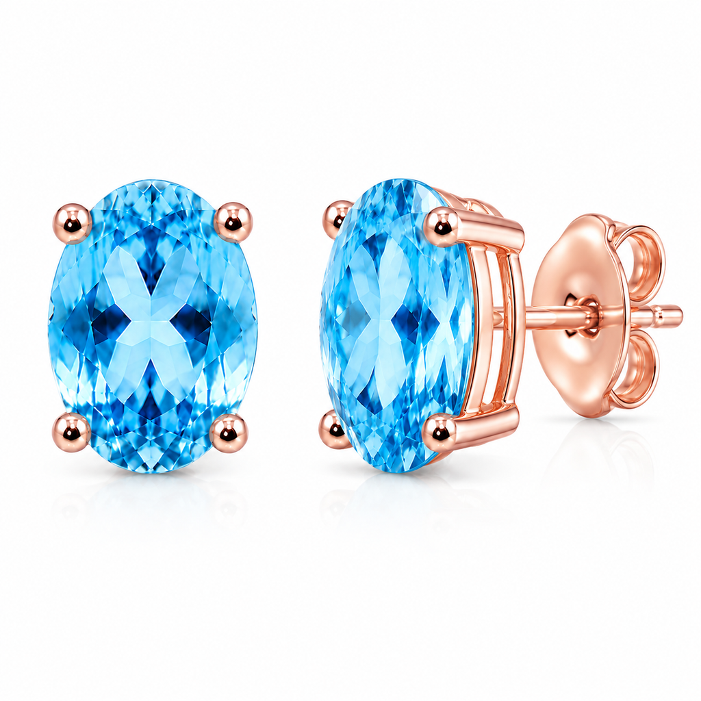 Macro close-up of natural 4x6mm Swiss Blue Topaz earrings with vivid blue facets and polished Rose Gold Plated settings