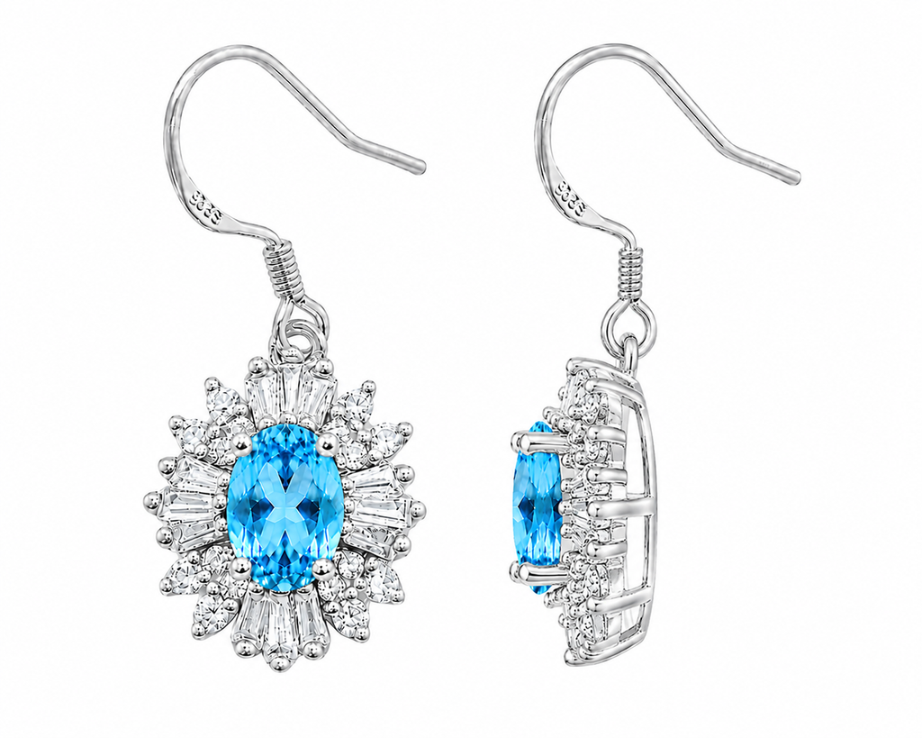 Side profile of 4x6mm Swiss Blue Topaz dangle earrings showing the open floral halo gallery and Platinum Plated silver setting