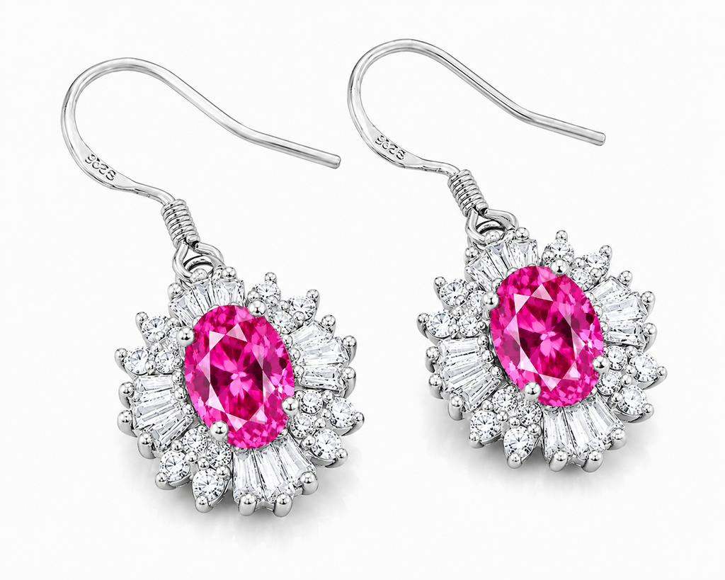 Pink Topaz floral dangle earrings shown at an angle with vivid oval gemstones, sparkling mixed-shape halos, and silver fishhooks