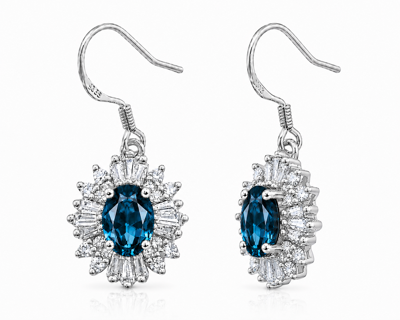 Front and side views of London Blue Topaz halo earrings showing gemstone depth, open basket setting, and fishhook ear wires