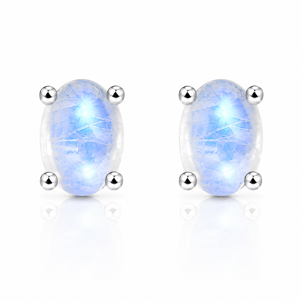 Natural 4x6mm oval moonstone stud earrings in 925 sterling silver on white background