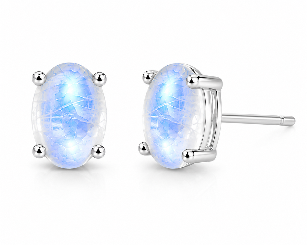 Macro close-up of natural moonstone stud earrings highlighting blue adularescence and gemstone brilliance