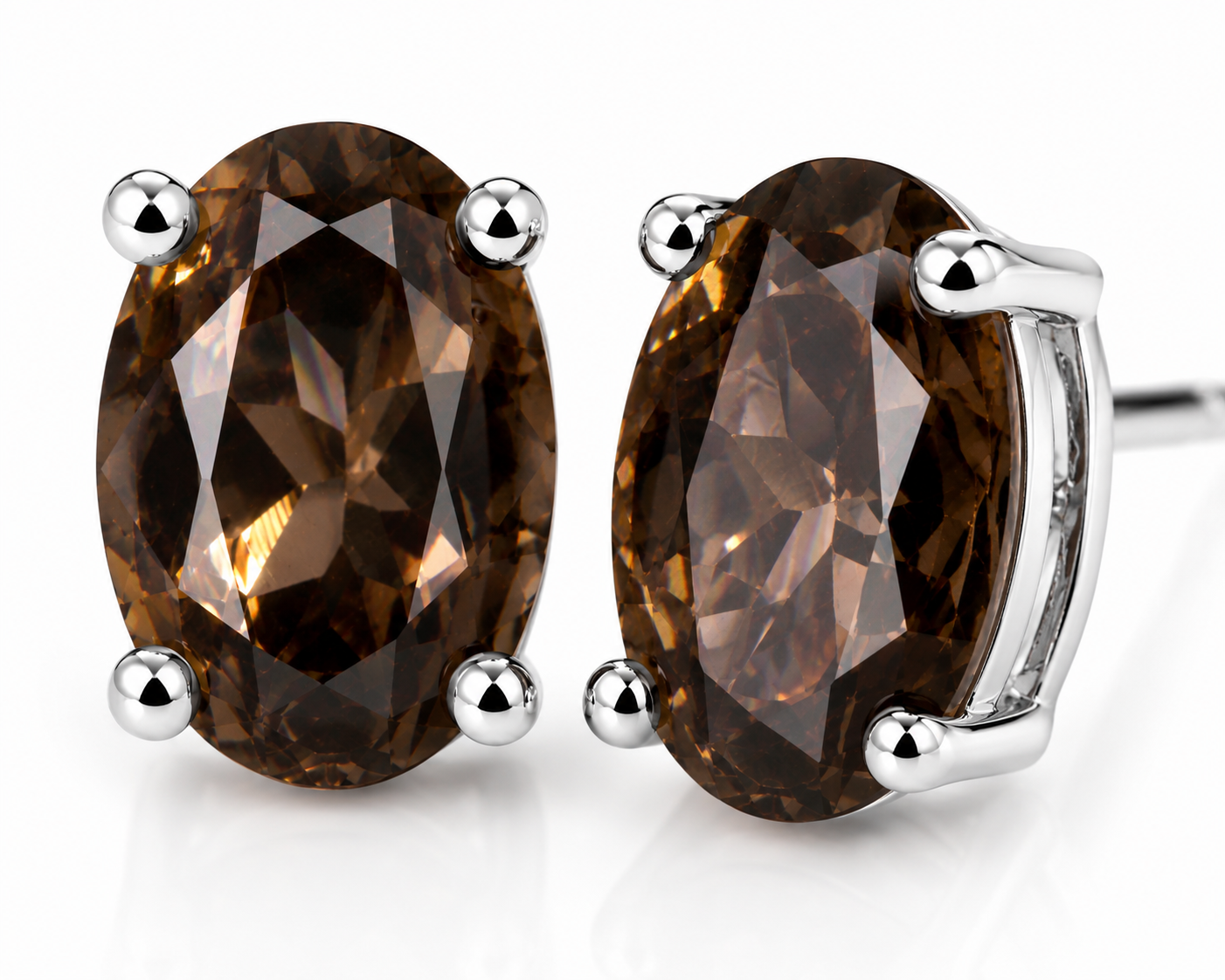 Macro close-up of natural smoky quartz gemstone stud earrings highlighting facets and brilliance