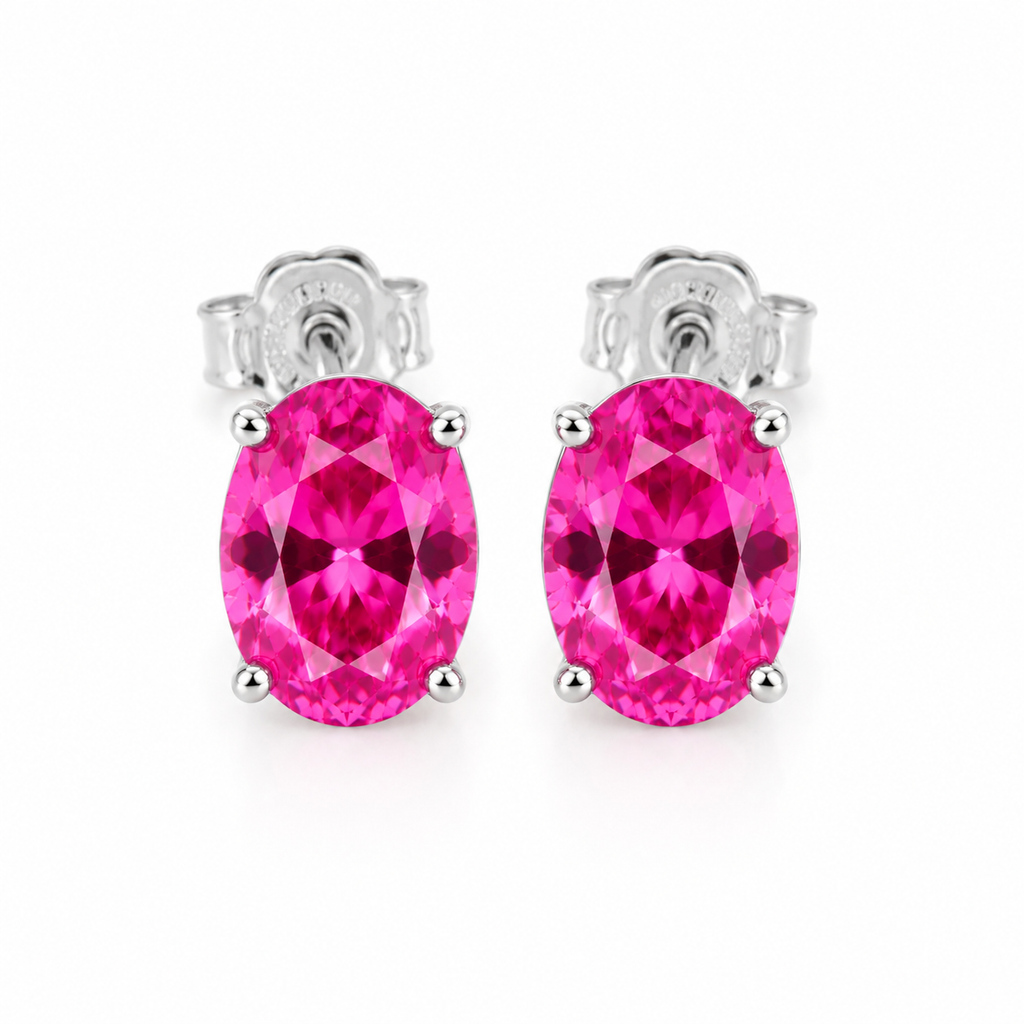 Top-down view of 4x6mm natural pink topaz stud earrings