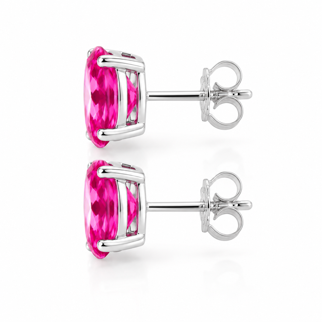 Side profile of natural pink topaz stud earrings showing four-prong basket setting