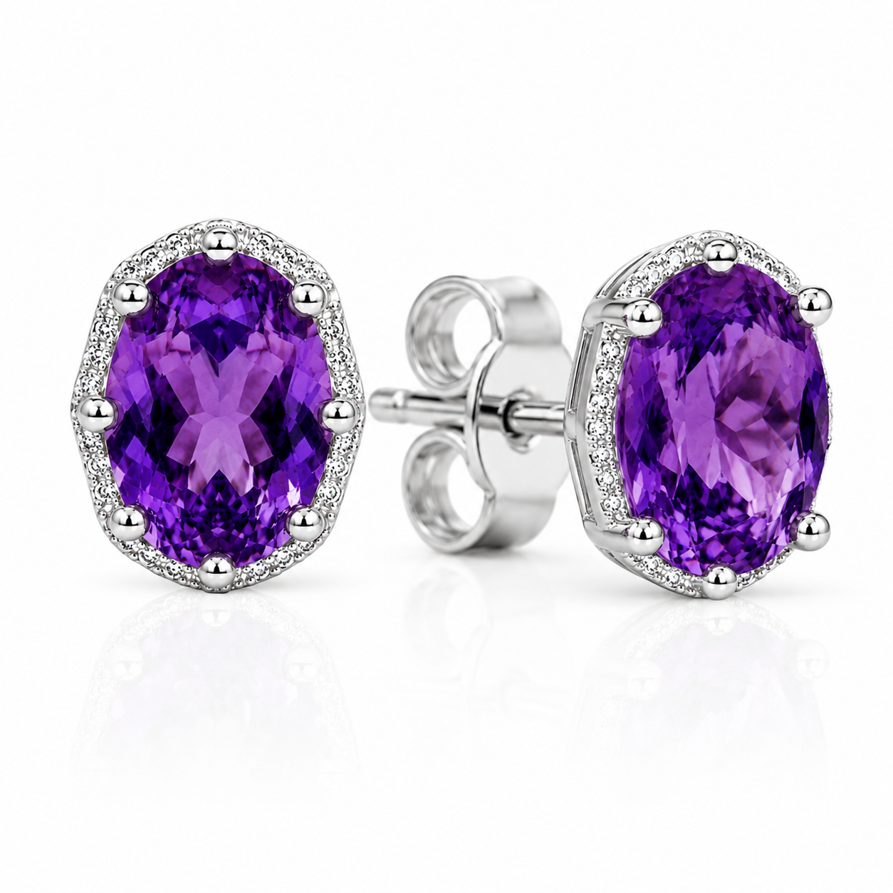 45-degree view of natural amethyst halo stud earrings in sterling silver