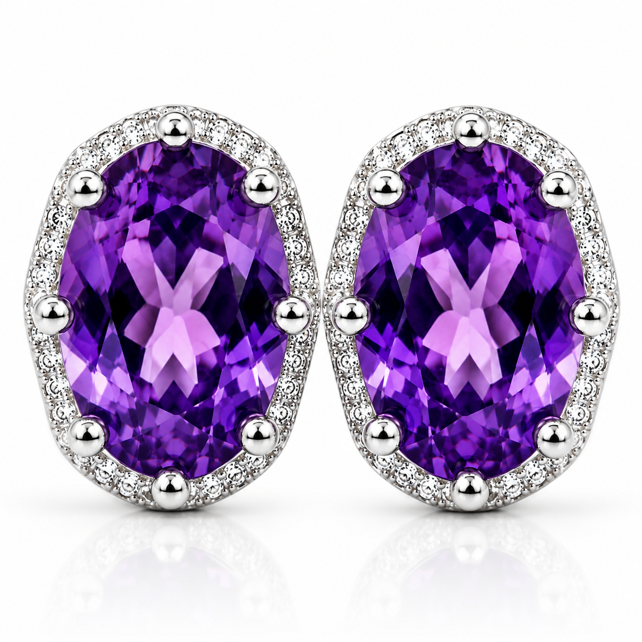 Macro close-up of natural amethyst halo stud earrings highlighting gemstone facets and sparkling cubic zirconia halo