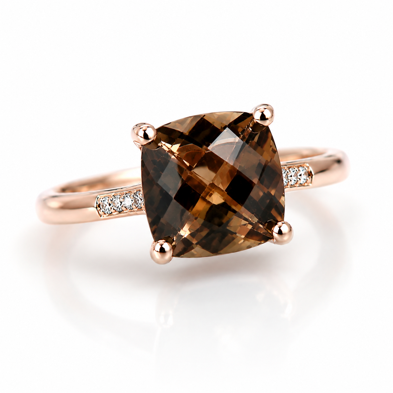 Top view of an 8mm natural smoky quartz cushion cut ring with sparkling cubic zirconia accents.