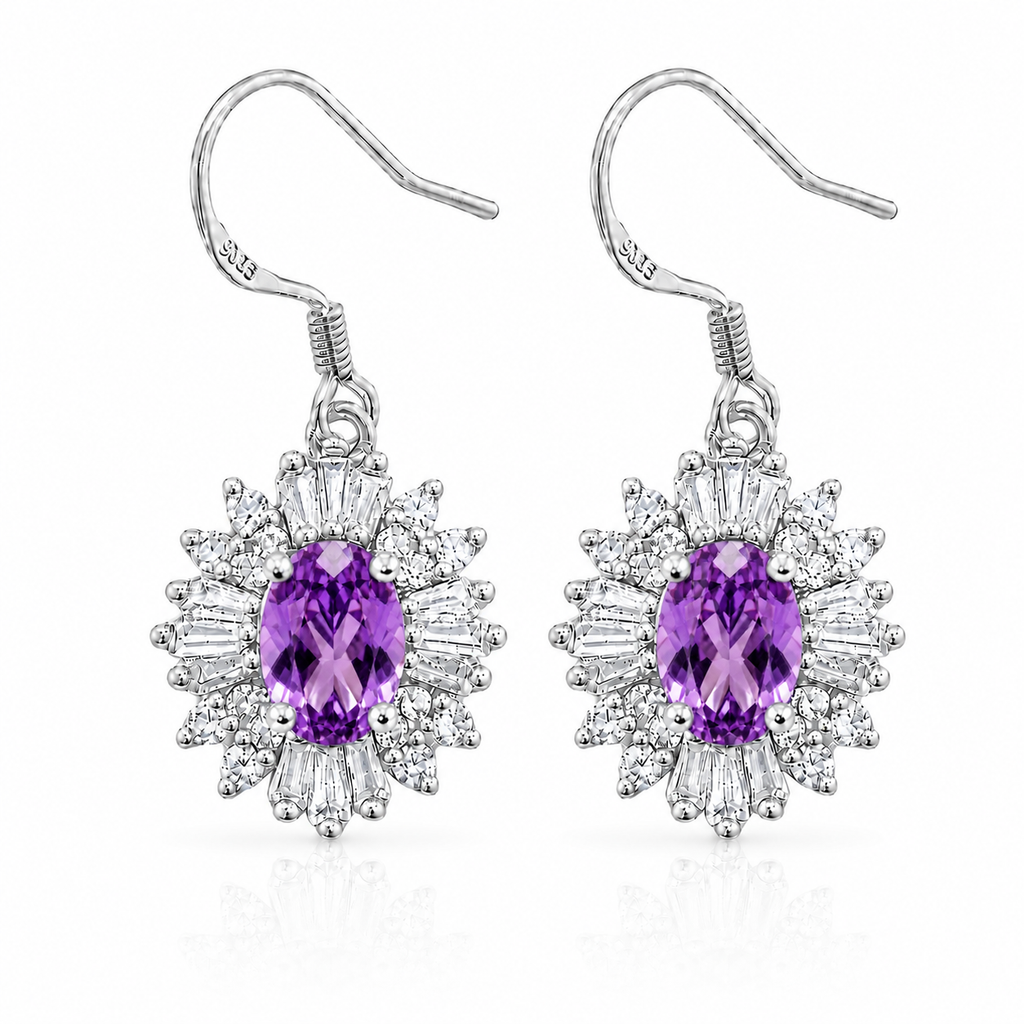 Top-down view of oval amethyst halo earrings showing purple gemstones, round accents, and tapered baguette stones.