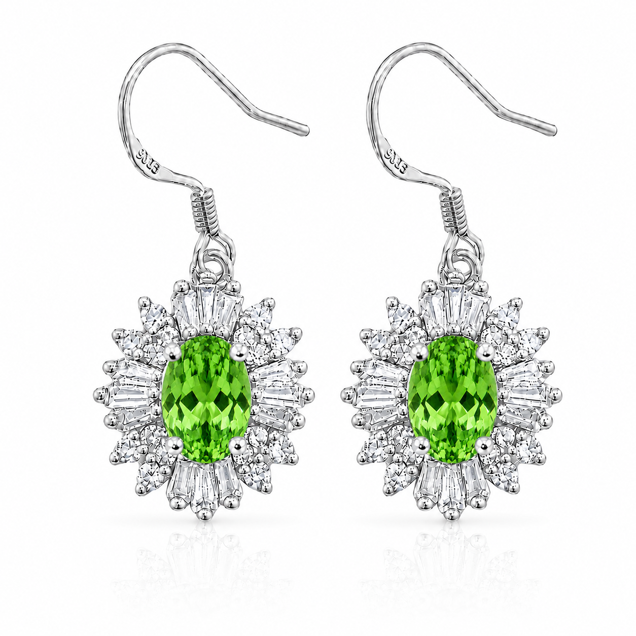 Natural 4x6mm oval tsavorite halo drop earrings crafted in 925 sterling silver with brilliant green gemstones and sparkling cubic zirconia accents.
