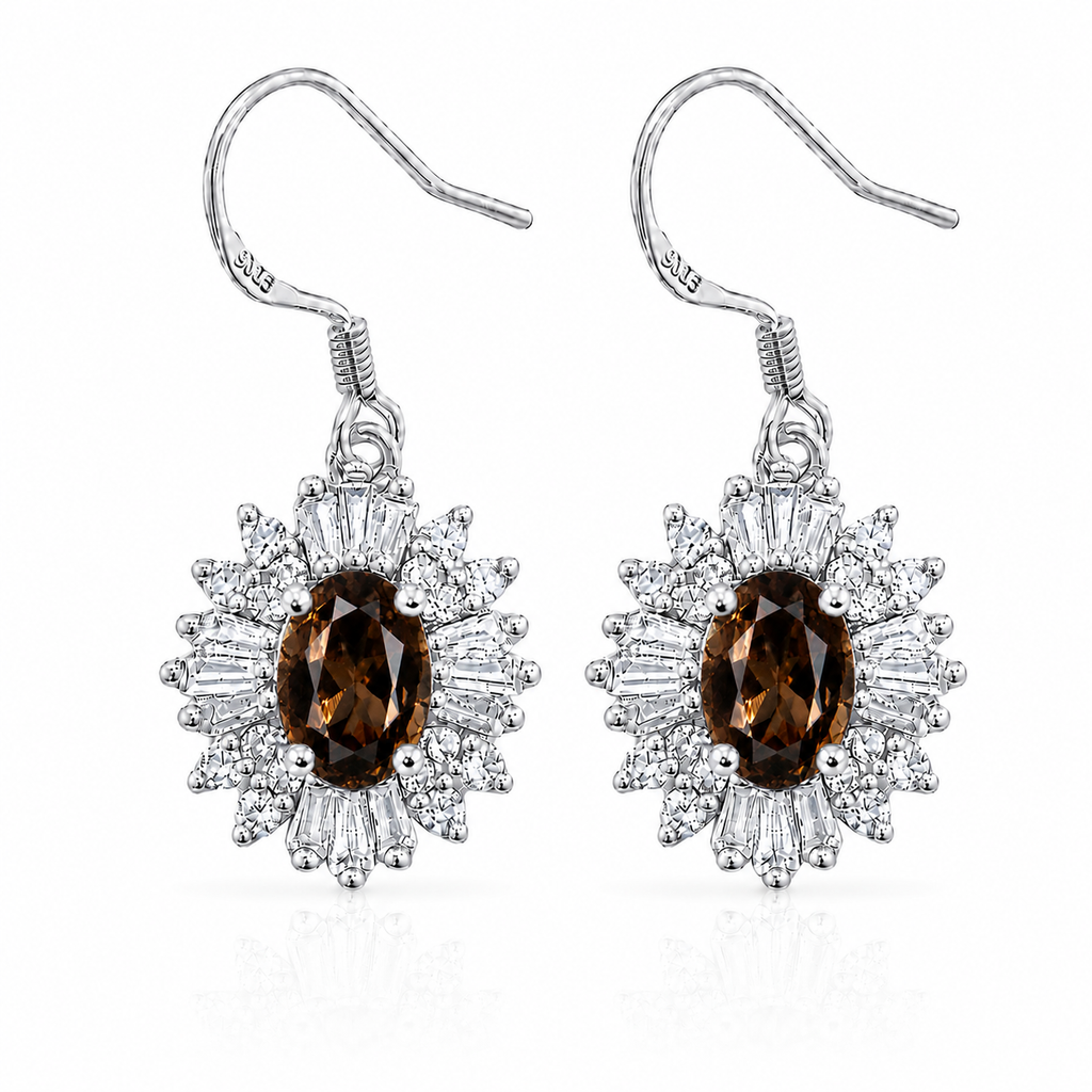Natural 4x6mm oval smoky quartz halo drop earrings crafted in 925 sterling silver with sparkling cubic zirconia accents.