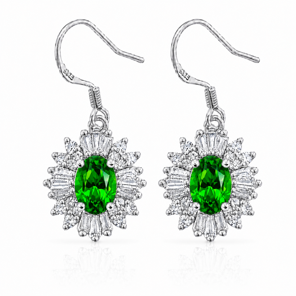 Natural 4x6mm oval chrome diopside halo drop earrings crafted in 925 sterling silver with vivid green gemstones and sparkling cubic zirconia accents.
