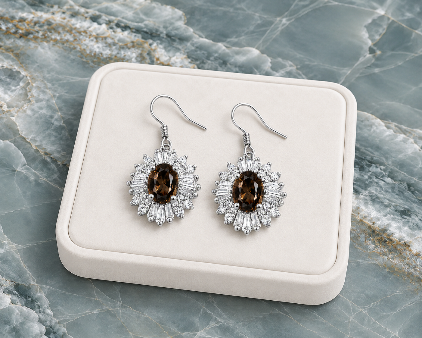 Natural 4x6mm oval smoky quartz halo drop earrings crafted in 925 sterling silver with sparkling cubic zirconia accents.