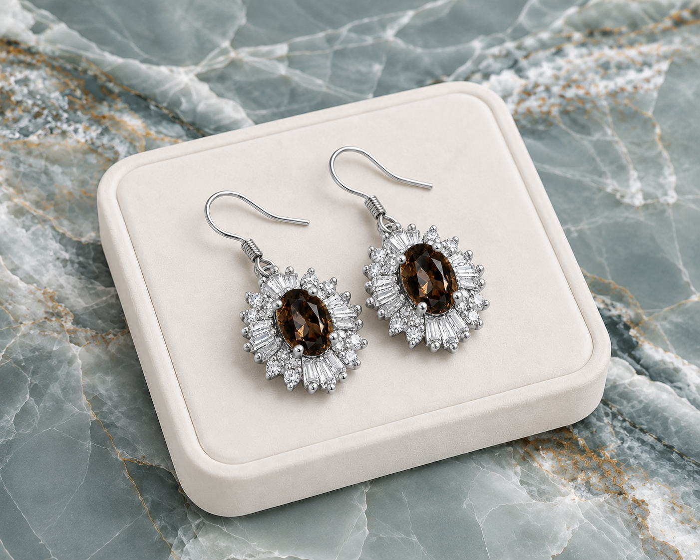 Natural 4x6mm oval smoky quartz halo drop earrings crafted in 925 sterling silver with sparkling cubic zirconia accents.