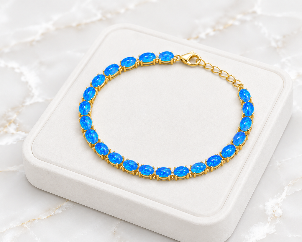 Natural Blue Fire Opal bracelet featuring 4x6mm oval Australian Fire Opals in 925 sterling silver with adjustable chain.