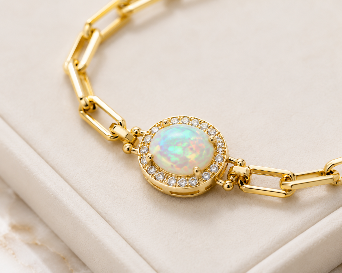  Luxury jewelry tray presentation of Natural Fire Opal Paperclip Chain Bracelet on marble background