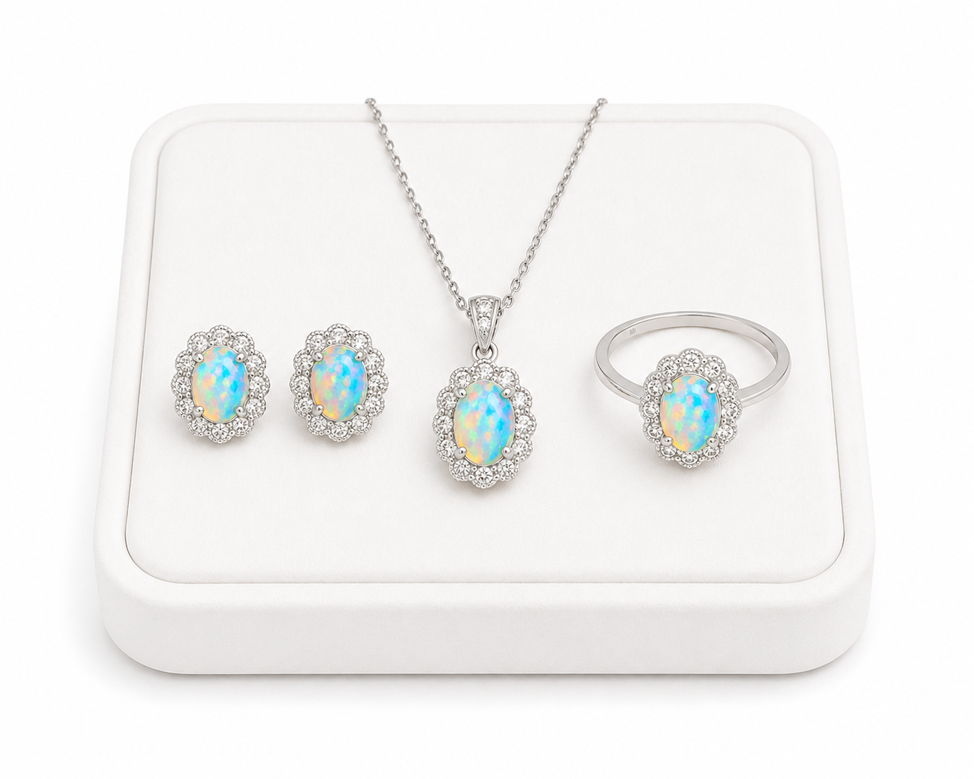 Premium Fire Opal jewelry set displayed on white jewelry tray