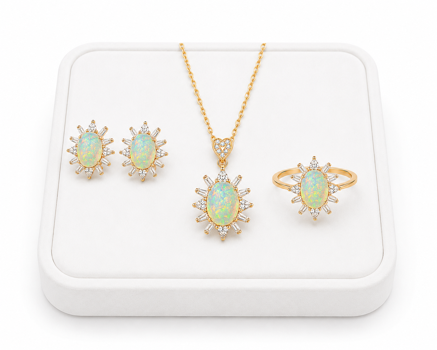 Fire Opal jewelry set displayed on a luxury white tray with a white background