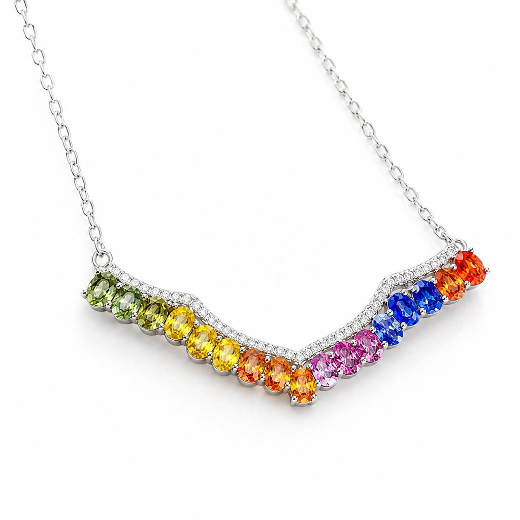 45 degree view of 3x4mm natural multicolor sapphire necklace with rainbow oval gemstones and sparkling accents.