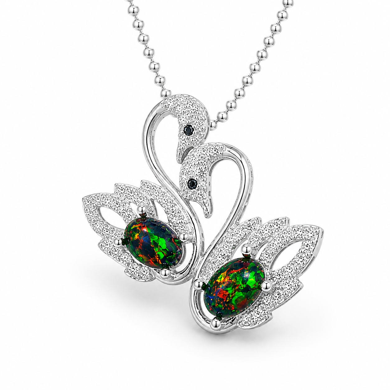 Top view of double swan necklace featuring two 5x7mm black fire opals with multicolor play-of-color