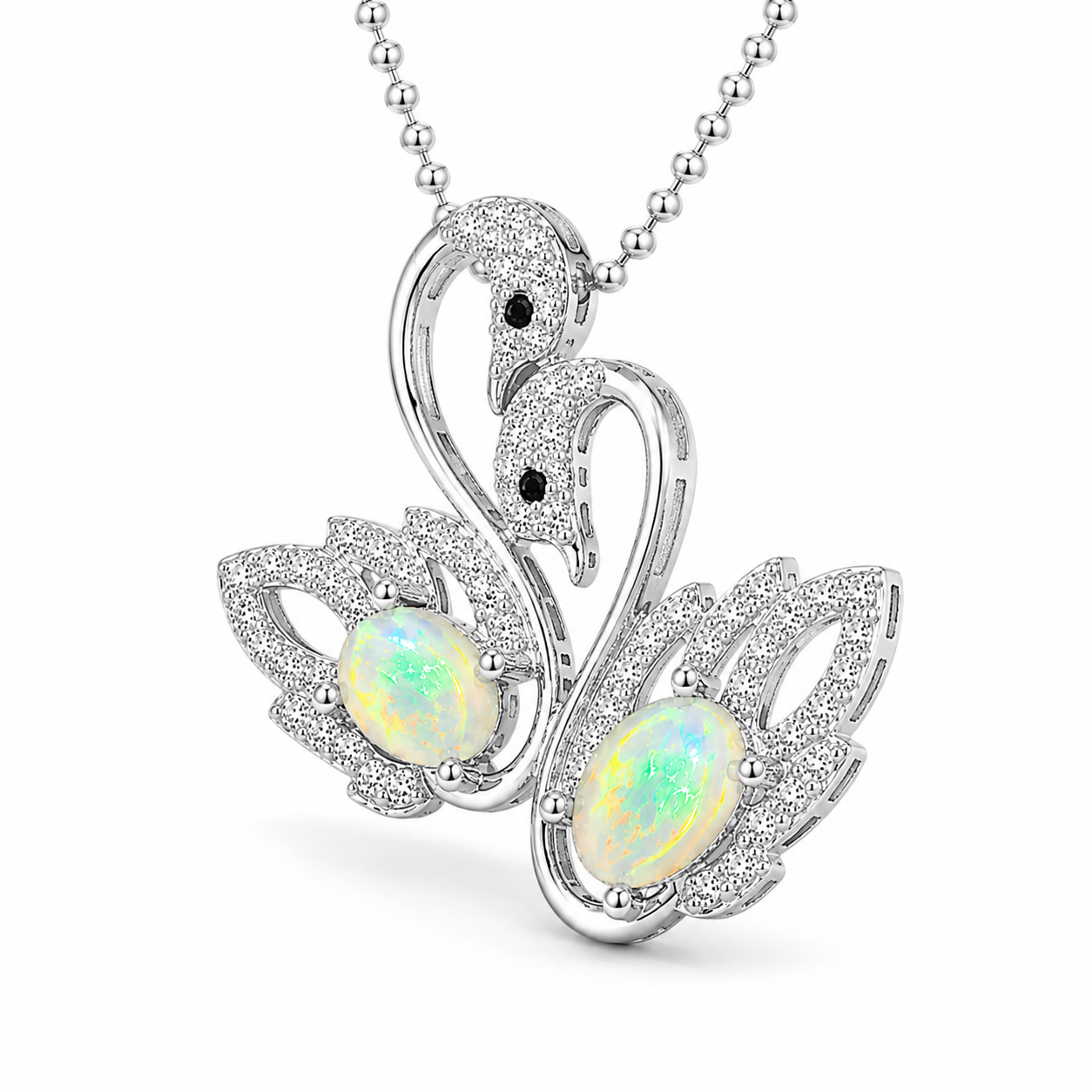 Side profile of sterling silver swan necklace featuring two 5x7mm white fire opals