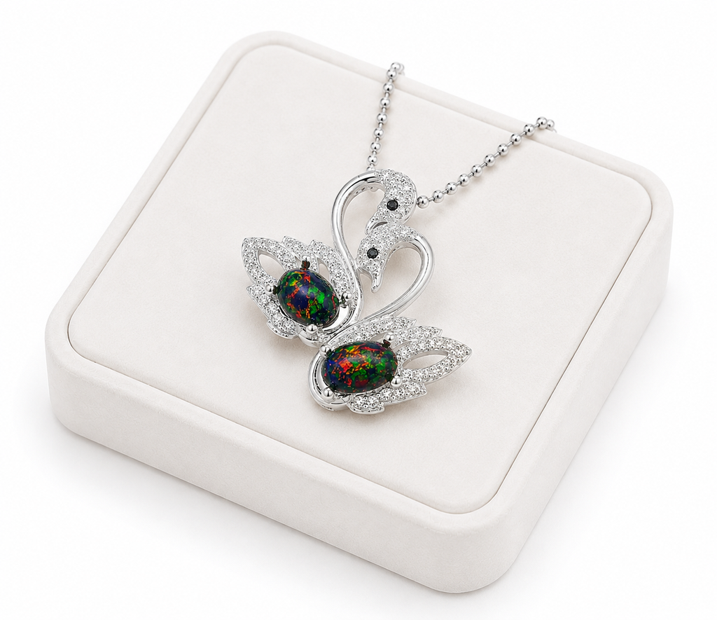 Colorful black fire opal double swan necklace with two 5x7mm oval Australian opals in sterling silver