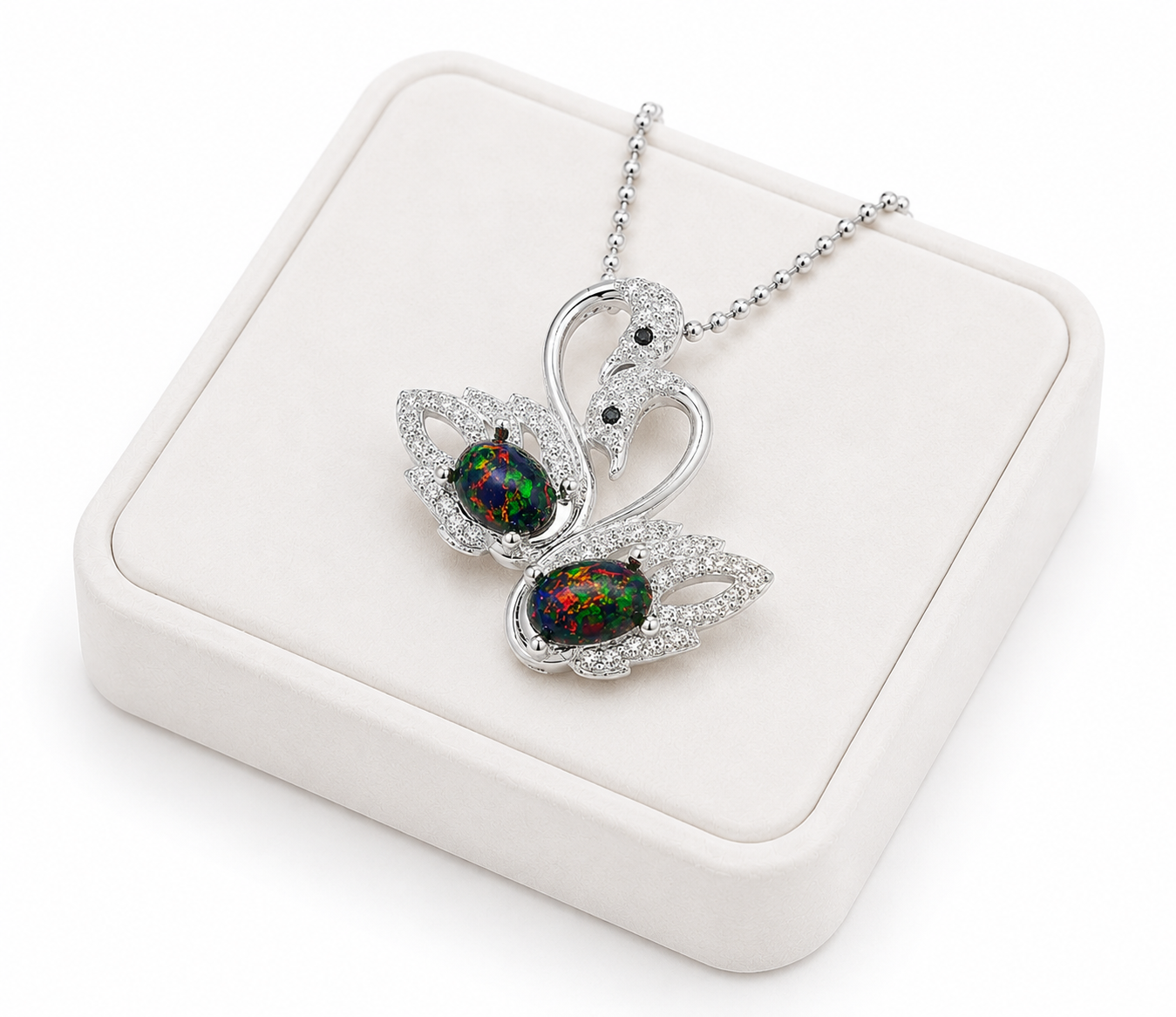 Colorful black fire opal double swan necklace with two 5x7mm oval Australian opals in sterling silver