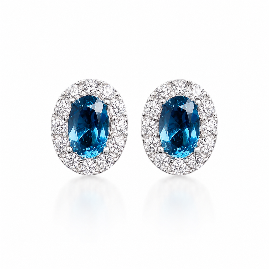 London Blue Topaz stud earrings 4x6mm oval gemstones in 925 sterling silver with CZ halo