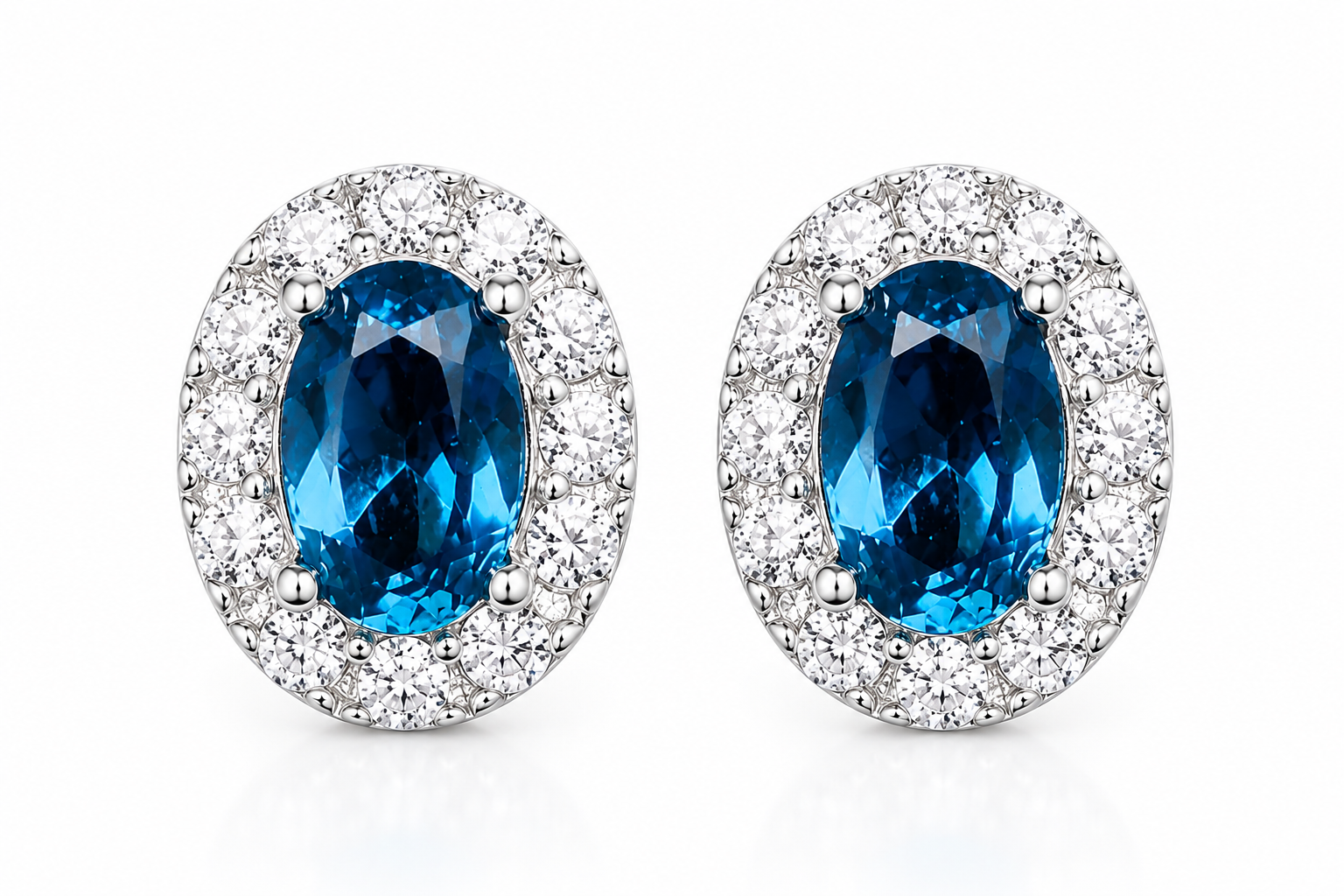 Top view of oval London Blue Topaz stud earrings with sparkling cubic zirconia halos