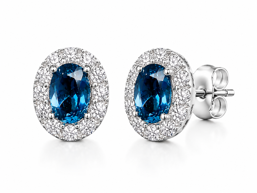 Macro close-up of London Blue Topaz earrings showing deep blue gemstones and CZ halo details